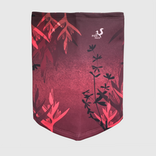 Ielādēt video galerijas pārlūkā, Women's A-line running skirt with an ombre (burgundy and pink) base and a Strelitzia floral pattern. The skirt has built-in black mid-length shorts with side pockets and a zipper pocket on the back.