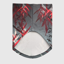 Ielādēt video galerijas pārlūkā, Women's A-line running skirt with an ombre (burgundy and pink) base and a Strelitzia floral pattern. The skirt has built-in black mid-length shorts with side pockets and a zipper pocket on the back.