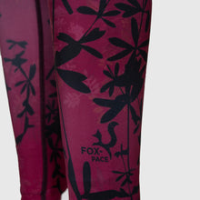 Ielādēt video galerijas pārlūkā, Women's A-line running skirt with an ombre (burgundy and pink) base and a Strelitzia floral pattern. The skirt has built-in black mid-length shorts with side pockets and a zipper pocket on the back.