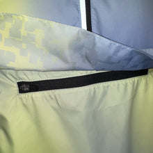 Ielādēt video galerijas pārlūkā, Women's A-line running skirt with an ombre (burgundy and pink) base and a Strelitzia floral pattern. The skirt has built-in black mid-length shorts with side pockets and a zipper pocket on the back.