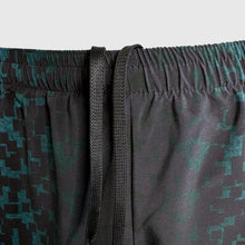 Ielādēt video galerijas pārlūkā, Women's A-line running skirt with an ombre (burgundy and pink) base and a Strelitzia floral pattern. The skirt has built-in black mid-length shorts with side pockets and a zipper pocket on the back.