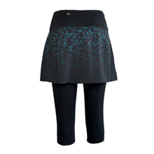 Ielādēt video galerijas pārlūkā, Emerald and ocean blue printed running skirt with black capri leggings and pockets, featuring flatlock seams and a zipped pocket.