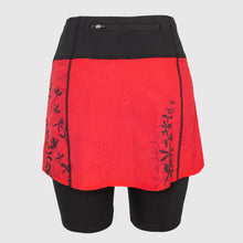 Ielādēt video galerijas pārlūkā, Women's A-line running skirt with an ombre (burgundy and pink) base and a Strelitzia floral pattern. The skirt has built-in black mid-length shorts with side pockets and a zipper pocket on the back.
